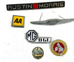 Selection of vintage car and motor cycle badges to include Austin Hilam, MG etc