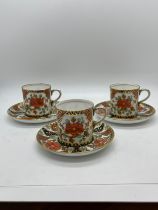 Set of three Aynsley coffee cups and saucers