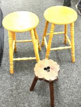 Two vintage stools and a vintage milking stool
