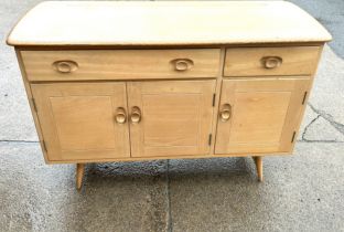 Blonde ercol mid century 2 drawer 3 door kitchen sideboard measures approximately 33 inches tall
