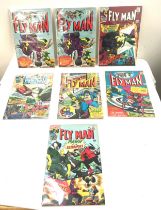 Selection of vintage ' Flyman' comics approx 7 in total