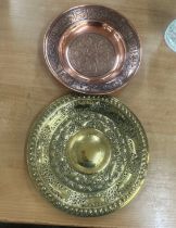 Two oriental plates one brass one copper