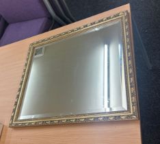 Vintage gilt framed mirror measures approx 26.5 inches tall by 23 wide