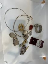 Selection of costume jewellery to include necklaces and some silver bracelets