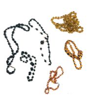 Selection of vintage bead necklaces to include amber