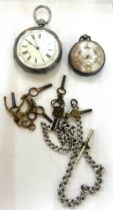 Vintage silver pocket watch and a ladies silver fob watch along with a silver Albert chain