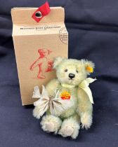 Small Steiff bear with butterfly in hand, boxed, height 7 inches