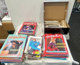 Selection of vintage knitting patterns and magazines
