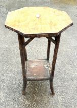 Small bamboo Octagonal plant stand measures approximately 28 inches tall 17 inches