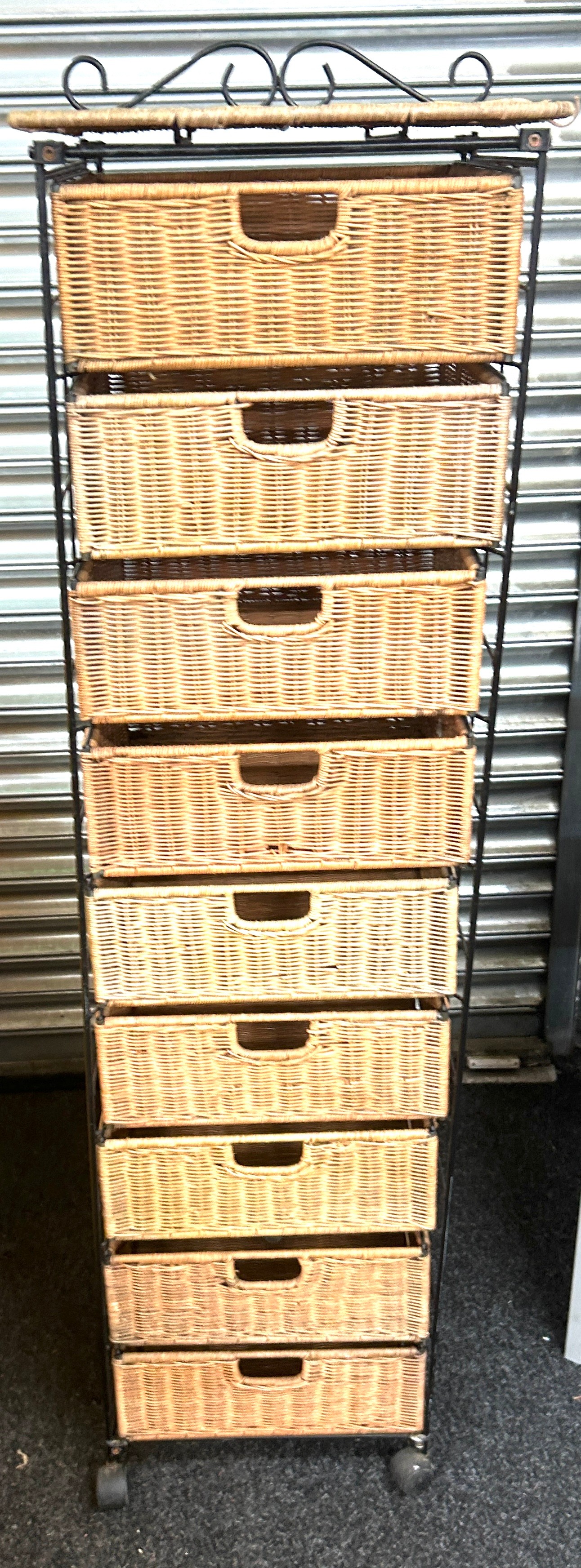 9 drawer metal and wicker storage drawers measures approx 59 inches tall by 16 inches wide and 14