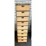 9 drawer metal and wicker storage drawers measures approx 59 inches tall by 16 inches wide and 14