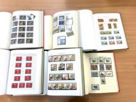 Selection of 6 stamp albums to include Comics, birds, Winnie the Pooh etc