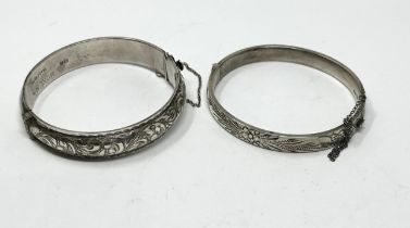 Two vintage silver etched design bangles, one by Georg Jensen (35g)