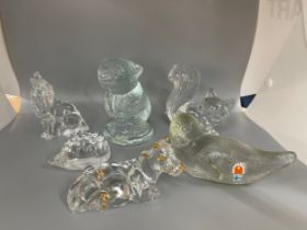 Selection of vintage glass paper weights includes Finland and swedish glass, Squirrel, cow, otter