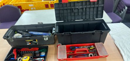 Selection of assorted tools in plastic tool boxes