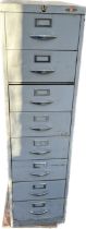 Metal 8 drawer filing cabinet, no lock, approximate measurements: Height 52 inches, Width 14 inches,