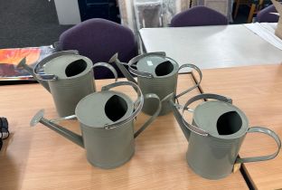 4 grey watering cans