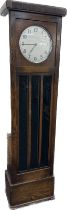 Oak grandmother clock three weights and pendulum measures approx 75 inches tall by 21 inches wide