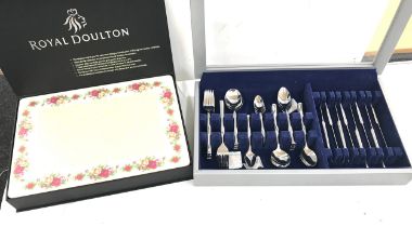 Royal Doulton Place matts and a canteen of cutlery