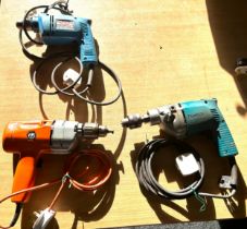 2 Makita electric drills, 1 Black and Decker, all in working order