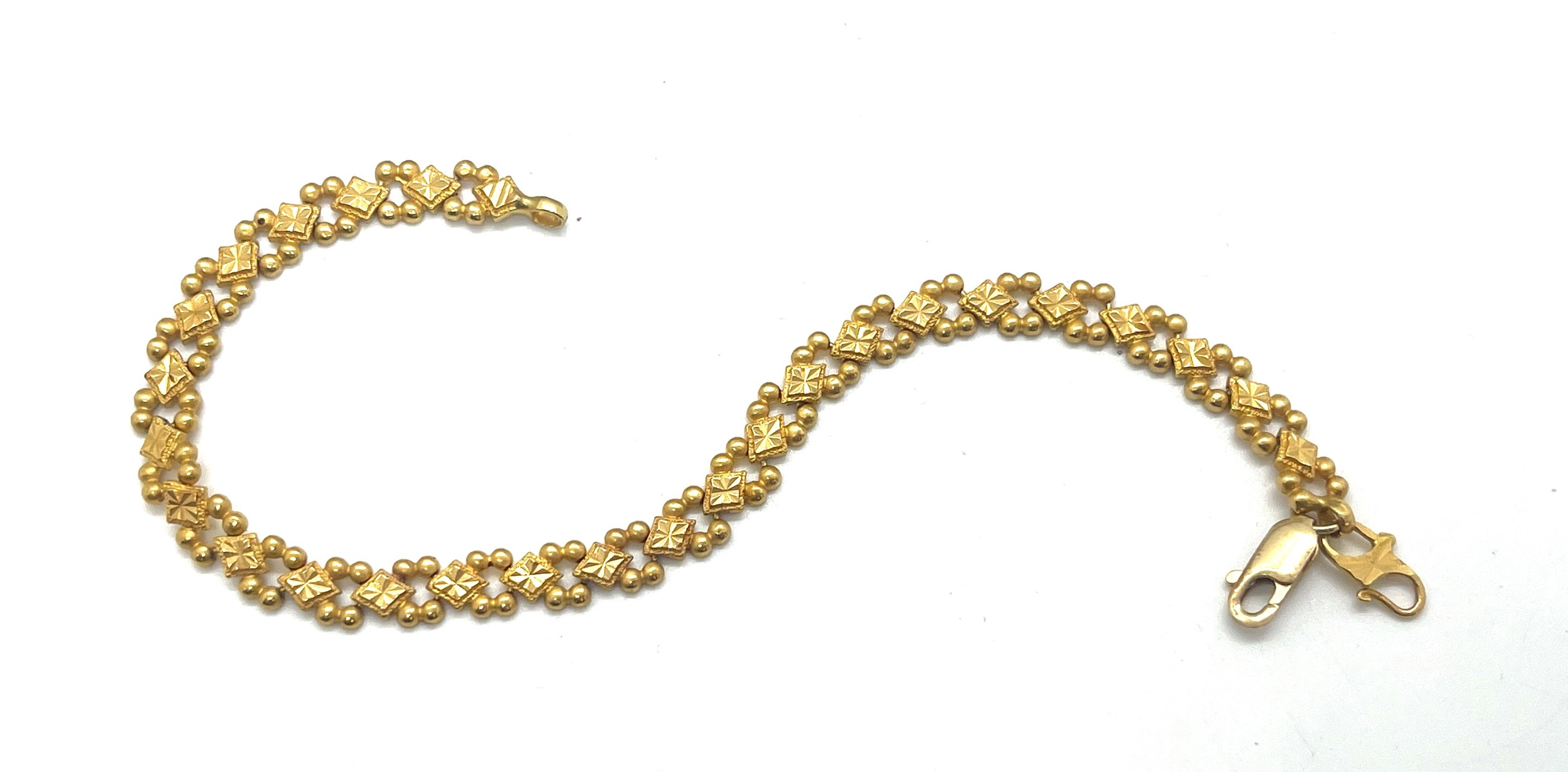 22ct gold ladies bracelet, with a repaired clasp which is 9ct gold, overall weight 12.4g, length