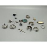 Large selection of silver jewellery includes pendants, earrings etc