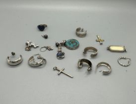 Large selection of silver jewellery includes pendants, earrings etc