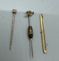 9ct gold bar brooch, 9ct gold stick pin and a 9ct gold topped hat pin