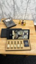 Selection of alcohol to include a Luxury Whisky gift set, a miniature Jack Daniels and flask set and