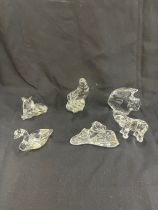 Selection of crystal glass paper weights includes Goeble, Wonders of wild etc