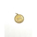 14ct gold pendant, Colosseum design, diameter of pendant 2.5cm, overall weight 3.2g