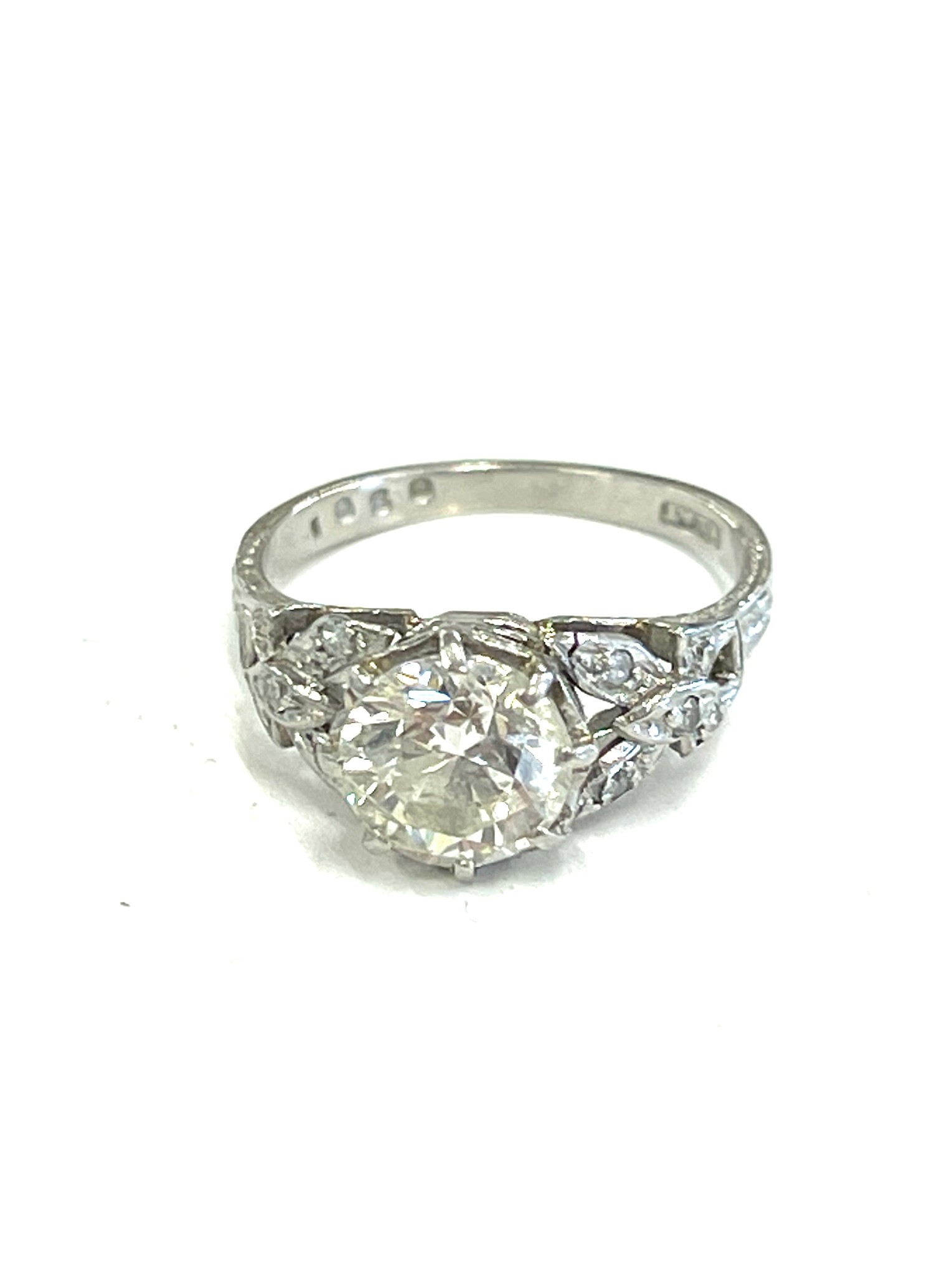 Hallmarked ladies platinum deco style old cut diamond set ring with diamond shank, center diamond