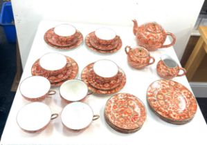 Chinese Orange and gold patterned Tea Set pattern called Golden Thousand Flower, made in Tai Po, New
