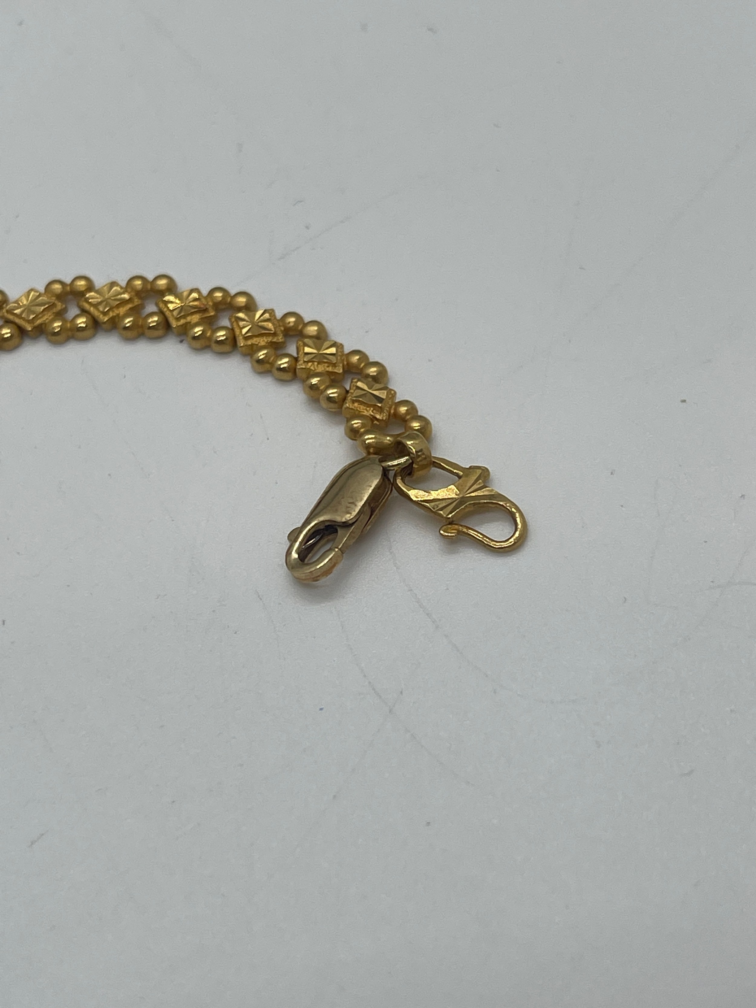 22ct gold ladies bracelet, with a repaired clasp which is 9ct gold, overall weight 12.4g, length - Bild 6 aus 8