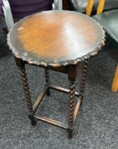 Oak barely twist occasional table measures approx 29 inches tall by 19 diameter