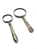 2 silver handle magnifying glasses