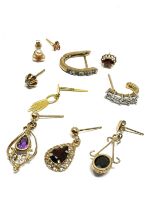 10 9ct gold gemstone set odd earrings inc dia amethyst garnet etc weight 5.2g