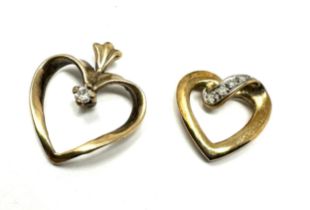 2x 9ct gold diamond heart shaped pendants (1.8g)