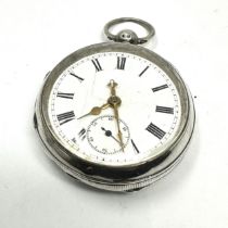 silver open face pocket watch the watch is ticking