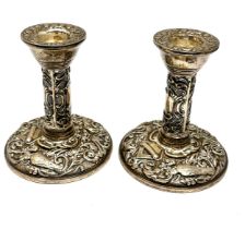 pair of vintage silver candlesticks measure height 10cm filled bases