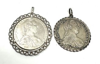 2 pendant framed M.Theresiad silver coins