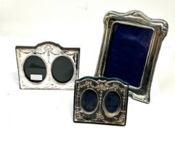 3 silver picture frames largest measures approx 17cm by 12cm