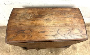 Oak gate leg barley twist table with two chairs measures approx leaf down 36 inches wide 18.5 inches