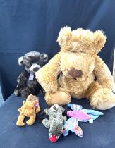 Selection of vintage teddies includes Ty butterfly, baboon and camel etc