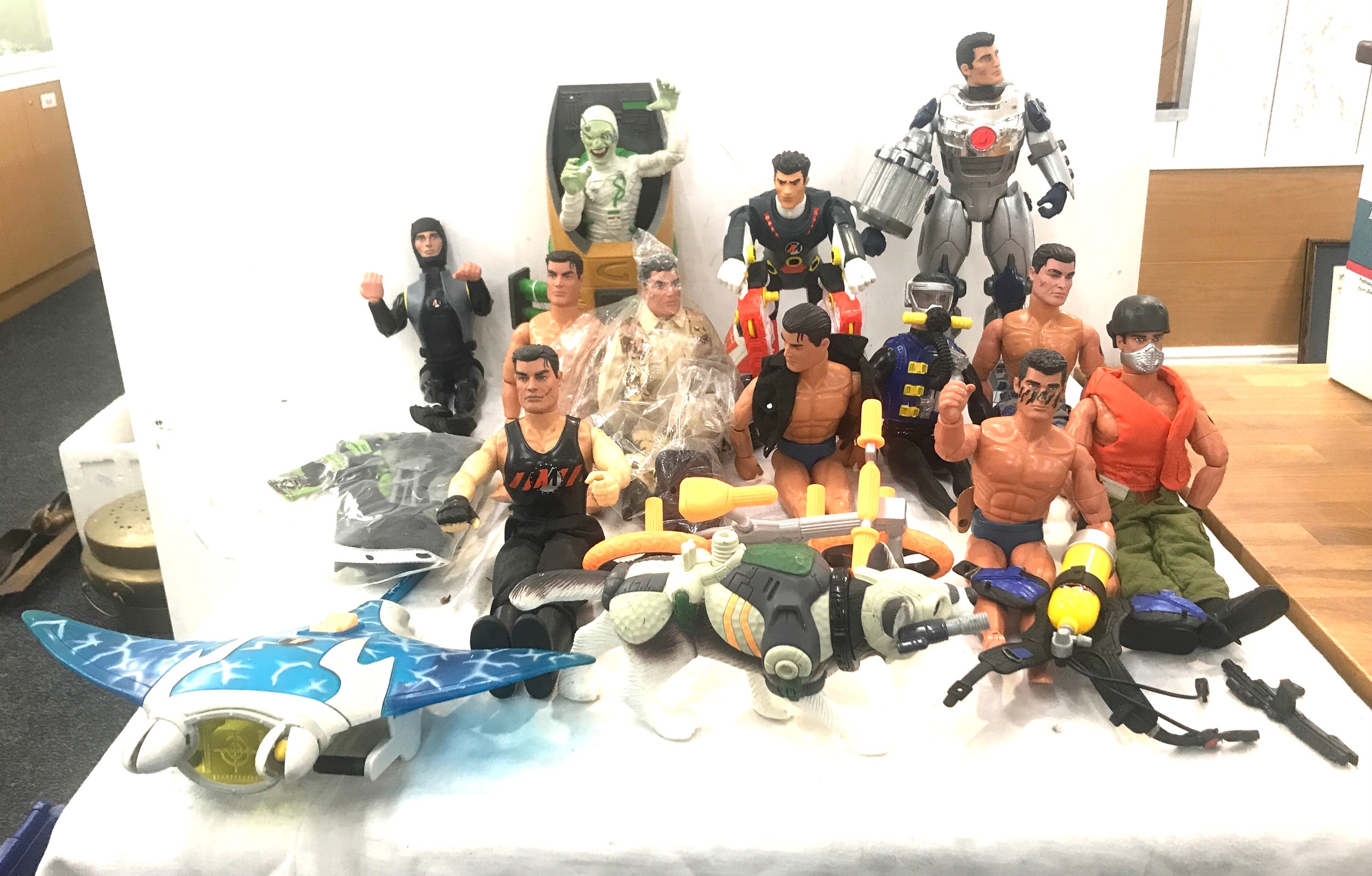 Selection of vintage action men figures and clothing