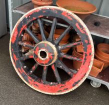 Vintage heavy wooden carriage wheel, approximate diameter: 38 inches