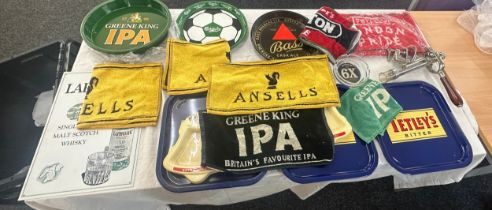 Selection of pub advertising pieces to include trays, beer pump, towels etc
