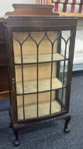 Mahogany china cabinet measures approx 53 inches tall, 13 deep and 24 wide