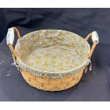 Vintage wicker basket with porcelain handles