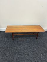 Teak coffee table measures approximately 63 inches wide 23 inches 18 inches tall